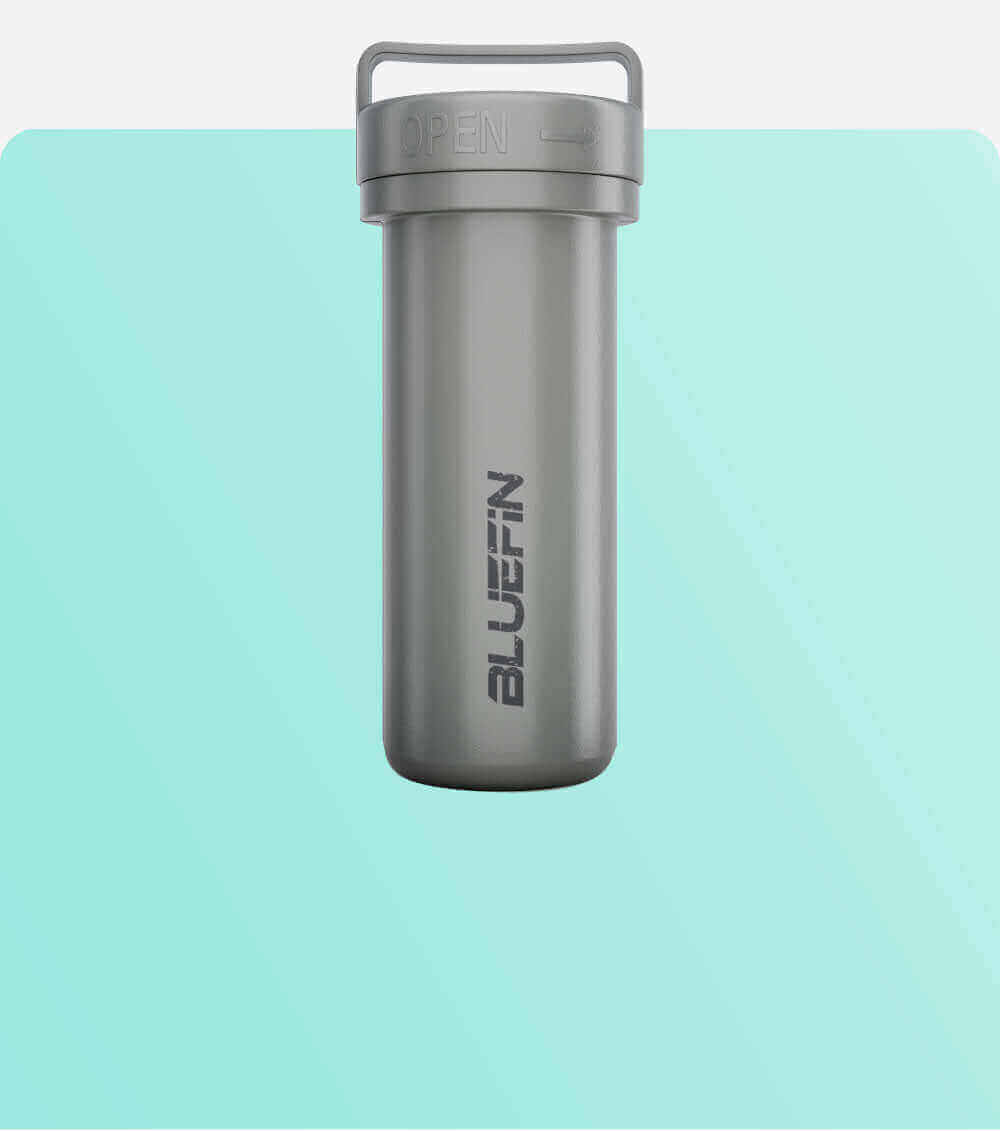 Gray waterproof container with an open lid and the word BLUEFIN printed on the side