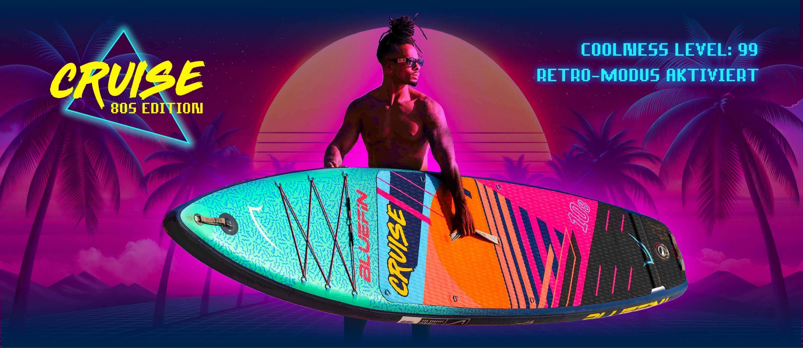 Colorful inflatable paddleboard with textured surface, center fin, and a person holding it outdoors