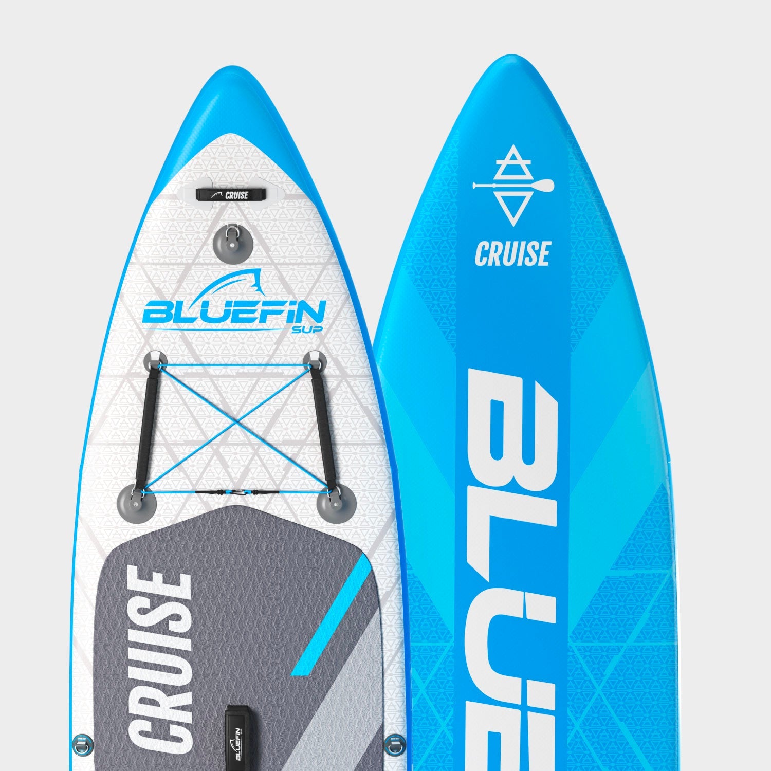 Inflatable paddleboard with blue and gray design, featuring a textured deck pad and center fin.