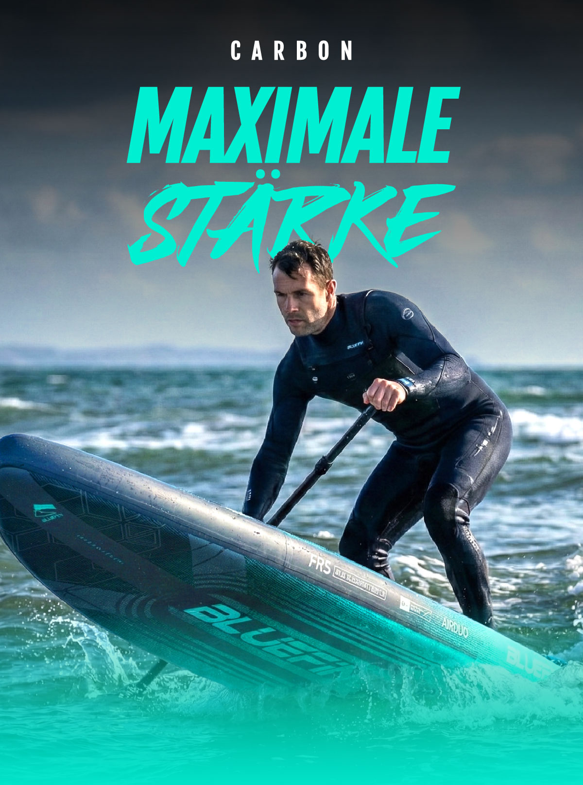 Man in wetsuit paddling a Bluefin inflatable paddleboard on ocean waves