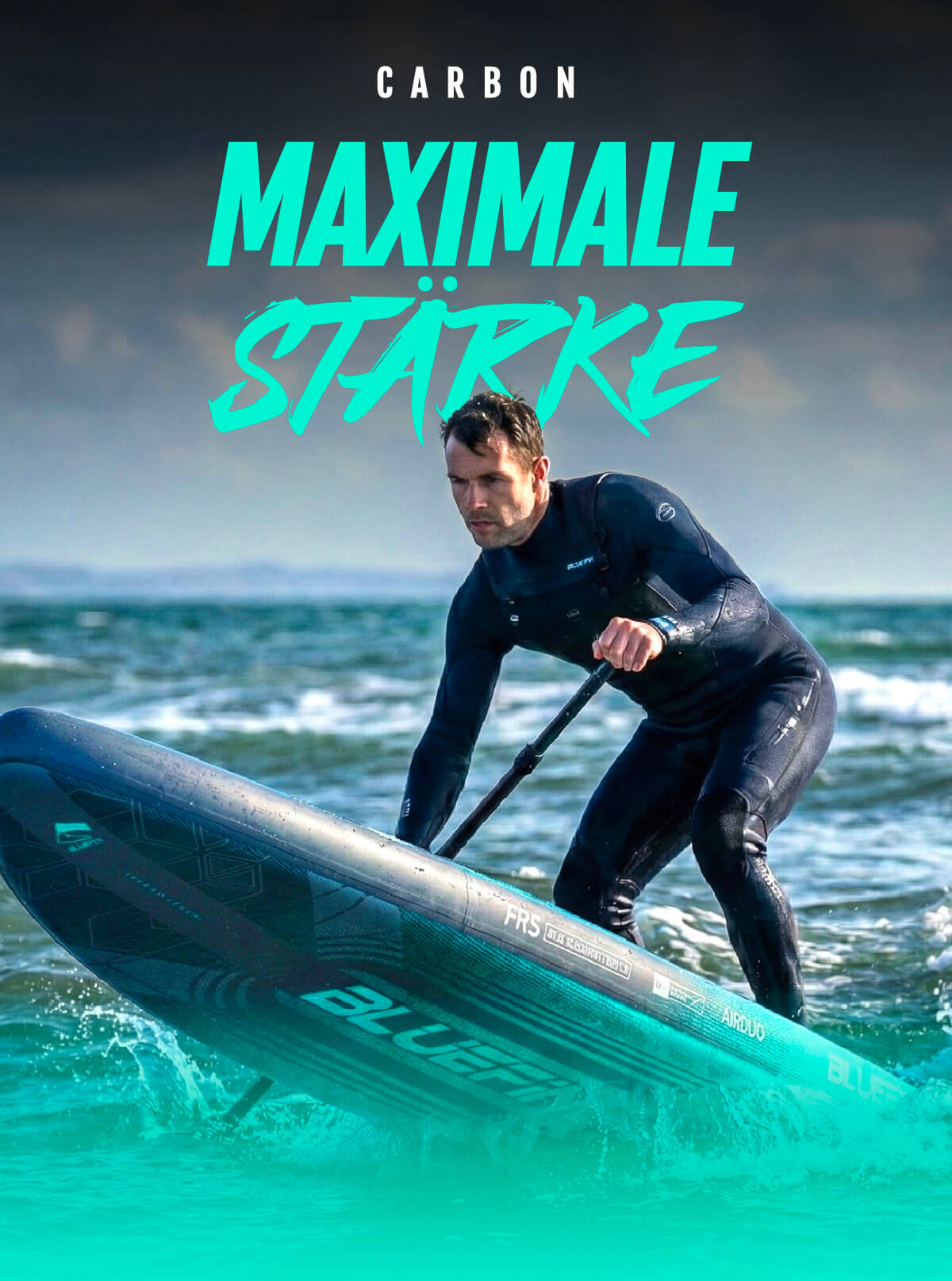 Man in wetsuit paddling a Bluefin inflatable paddleboard on ocean waves