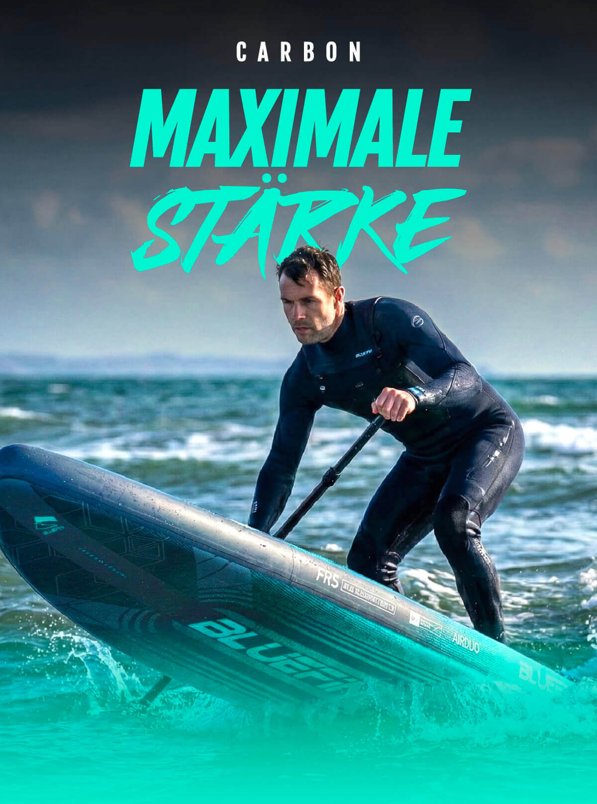 Man in wetsuit paddling a Bluefin inflatable paddleboard on ocean waves