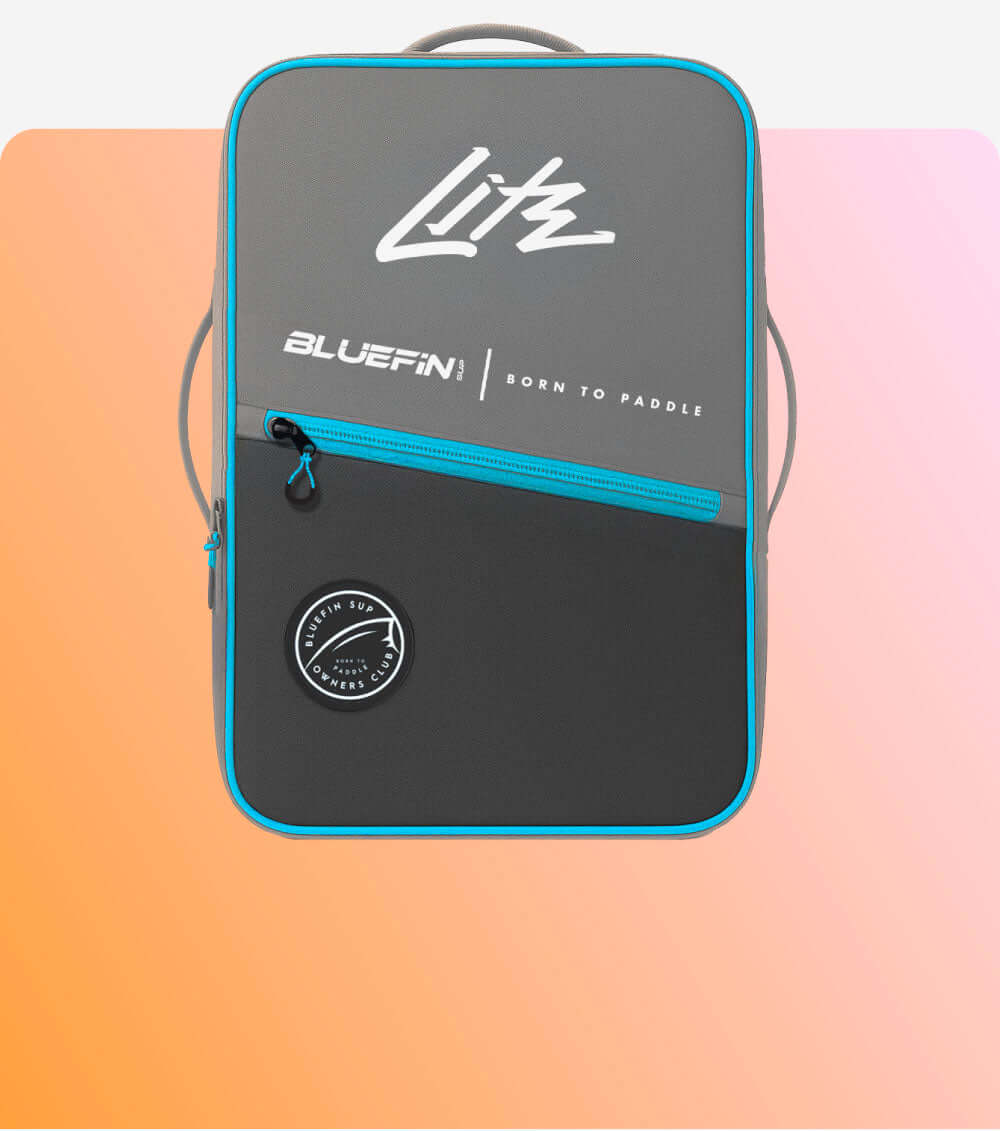 Gray backpack with blue zipper, featuring Bluefin logo and round patch on front.