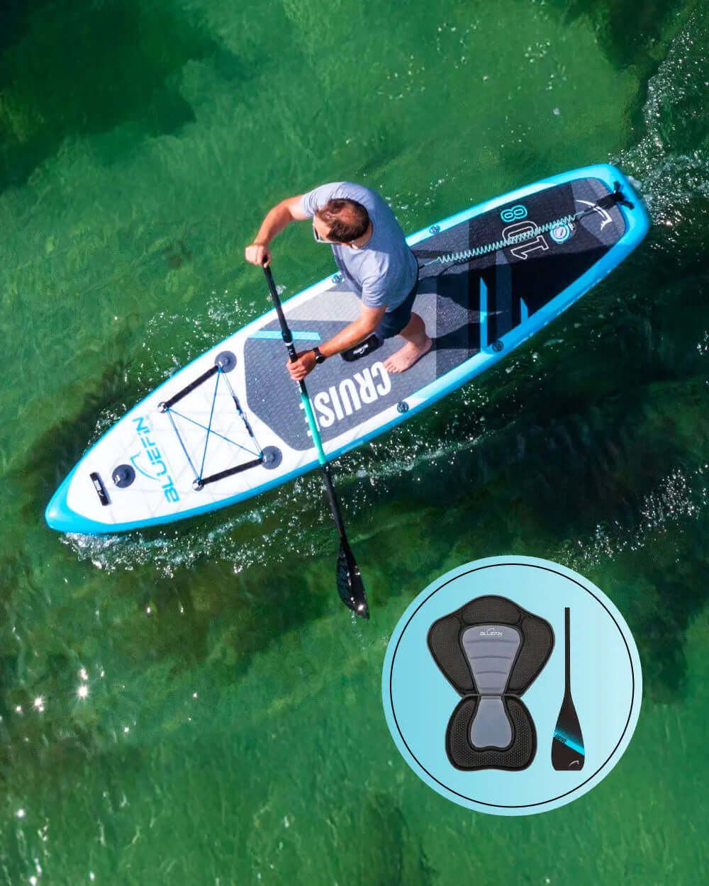 Man paddleboarding on a bluefin cruise inflatable stand up paddle board on the ocean, showcasing on the side that it also comes with a kayak seat