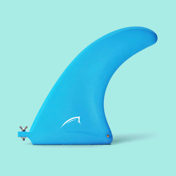 Blue surfboard fin with a curved shape and a white logo, mounted on a light blue background.