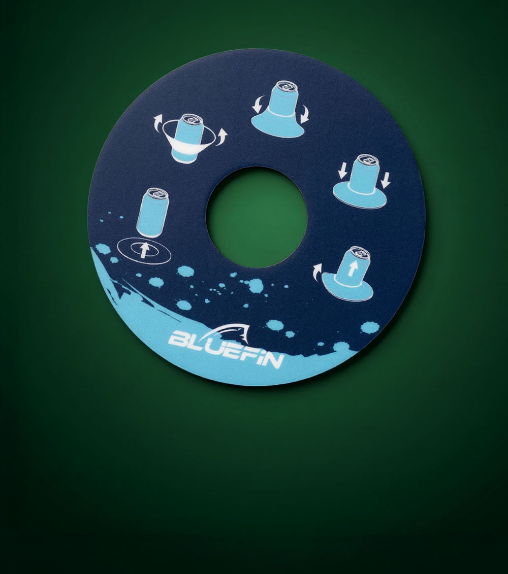 Round blue instruction disc with graphics for can placement and rotation, featuring Bluefin logo.