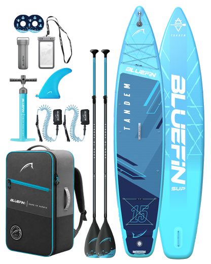 Inflatable tandem paddleboard in blue with two paddles, pump, fin, backpack, and accessories.